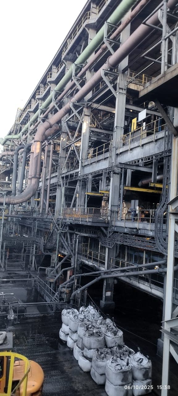 Multi-level industrial steel structure with pipe racks and walkways