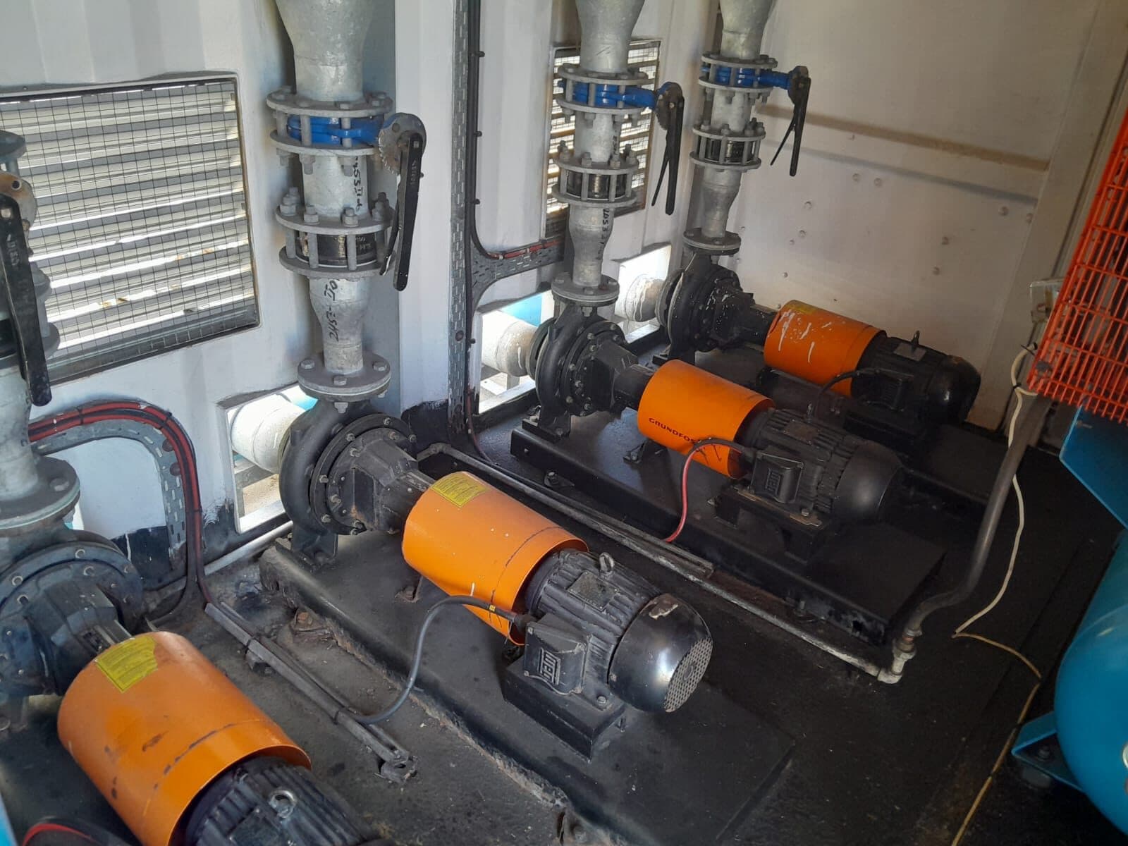 Grundfos pump station with industrial pumps and pipework