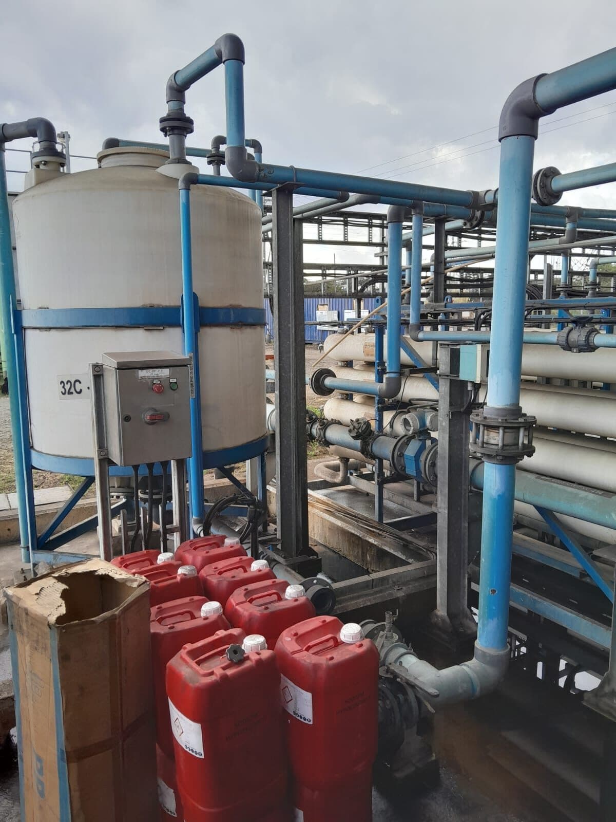 RO water treatment plant with chemical dosing tanks and pipework
